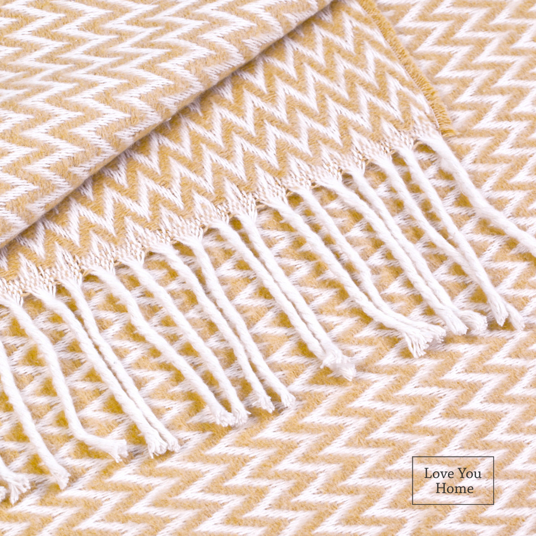 Coperta in cotone con angoli a zigzag · 2