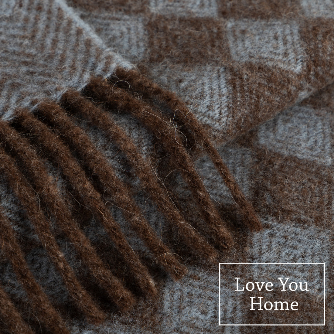 Coperta in lana vergine motivo a rombi · 2